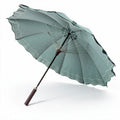 Regenschirm mit grünem geometrischem Muster aus strapazierfähigem Material 80 x 80 x 100 cm